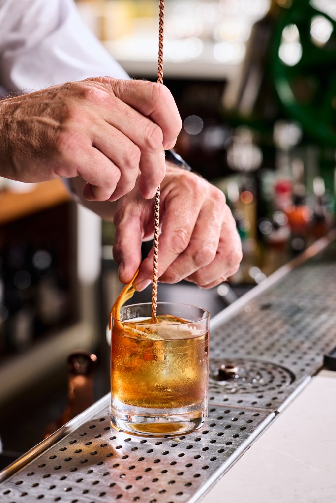 Bartender mixing a cocktail