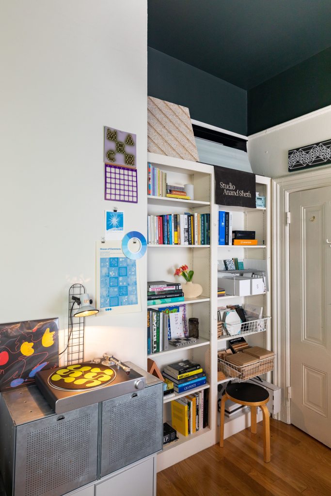 Room with a ceiling painted black