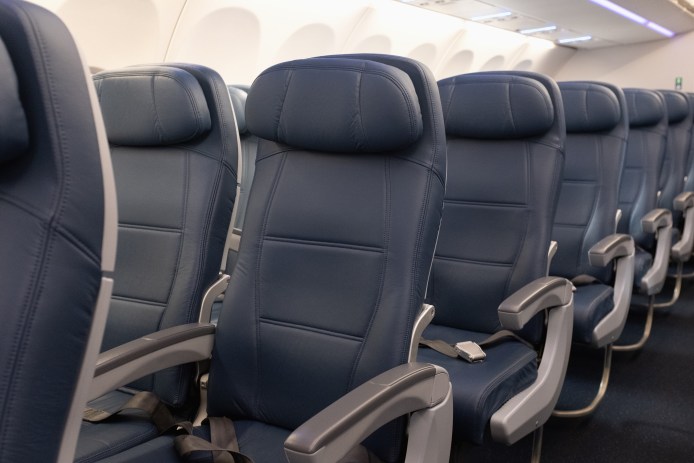 Airplane interior empty seats