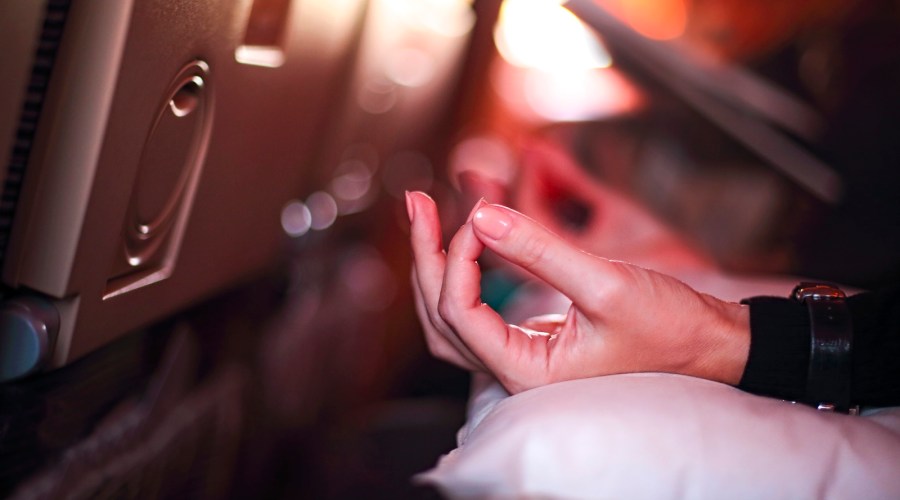 These Are the Airplane Stretches a Yoga Instructor Does to Stay Centered and Relaxed While Flying