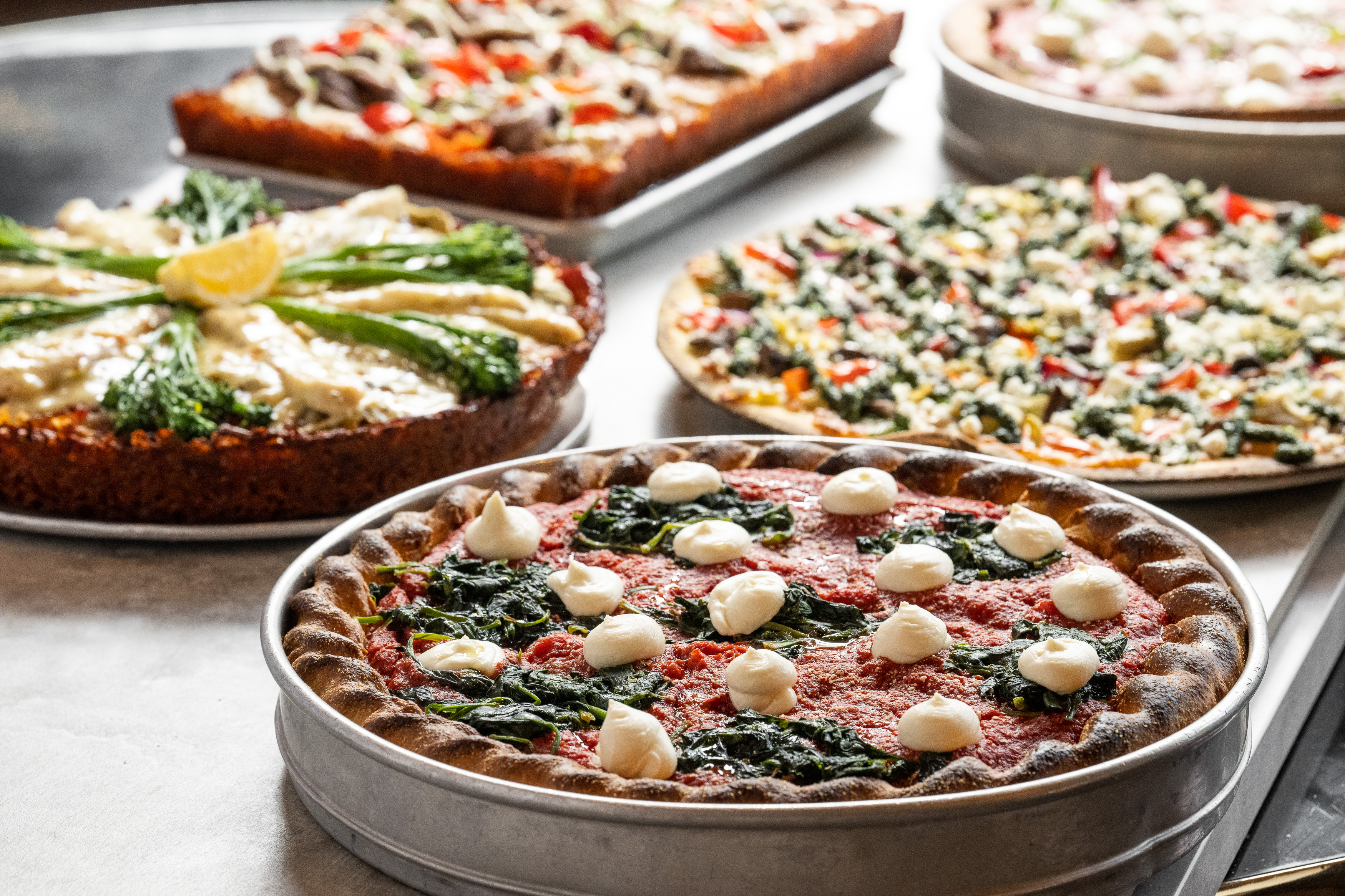 assortment-of-capos-pizzas