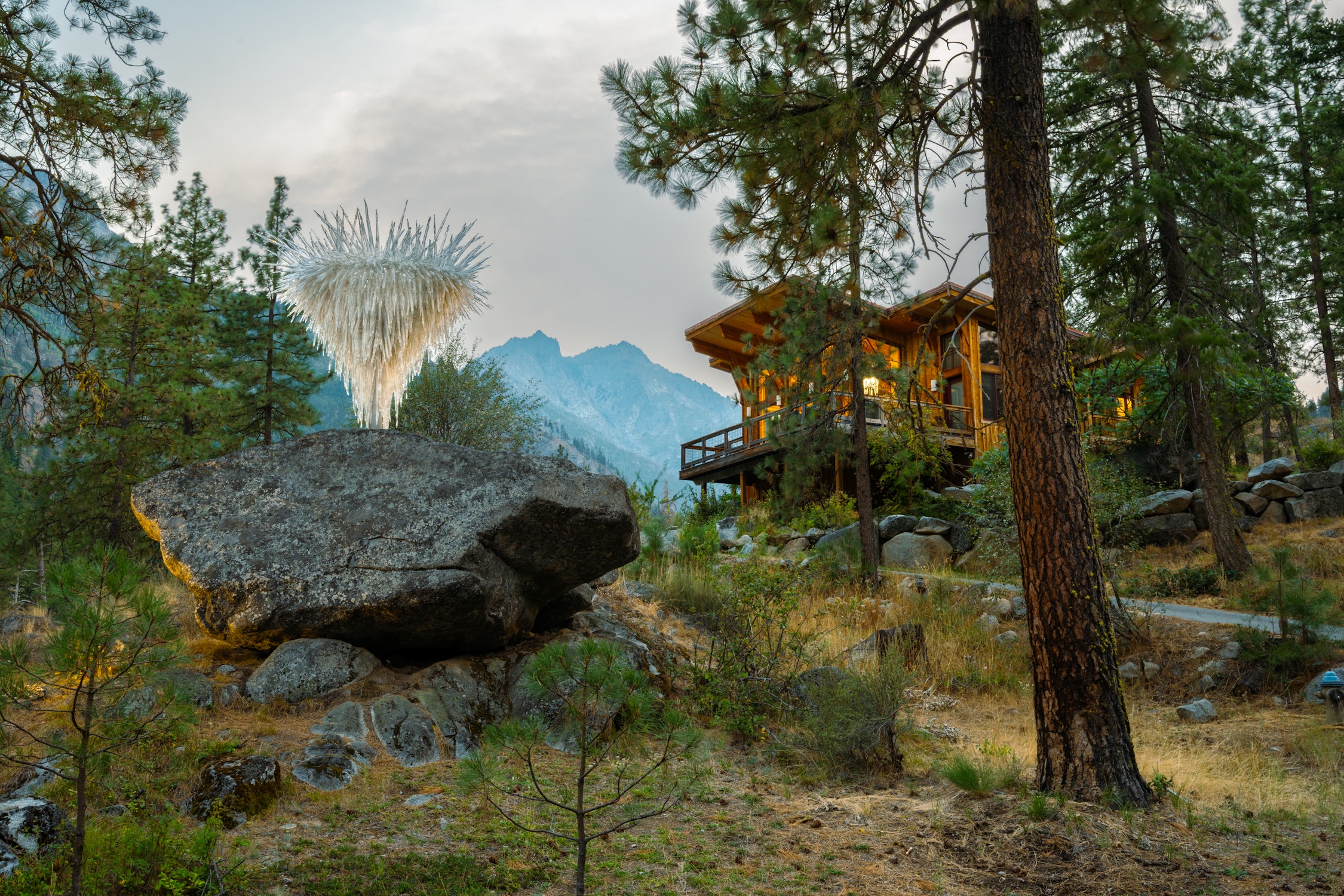 chihuly-icicles-with-cabin-sleeping-lady-mountain
