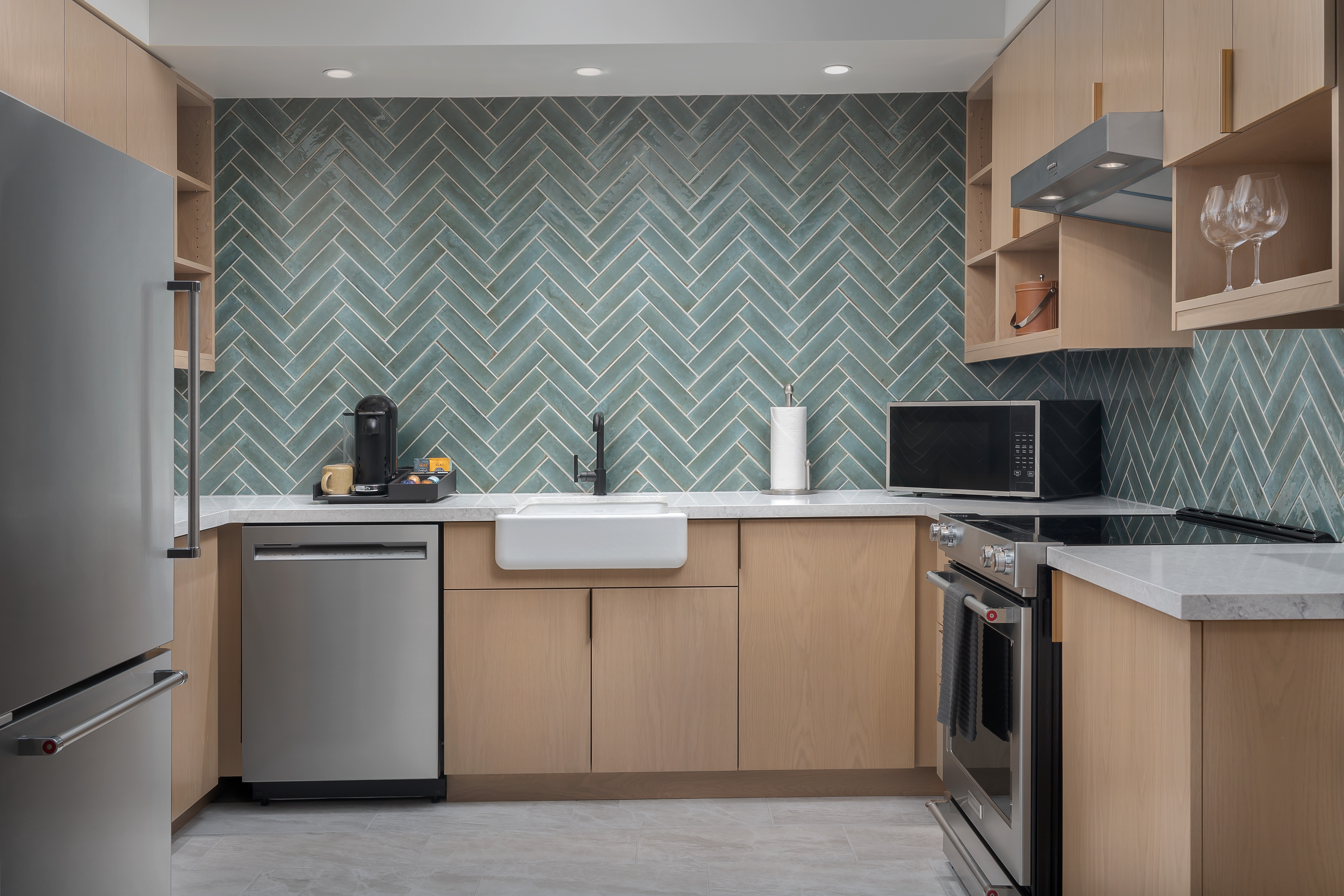 the-king-suite-kitchen-unit-features-professional-grade-appliancesand-opens-to-a-comrotable-living-room-with-a-fireplace