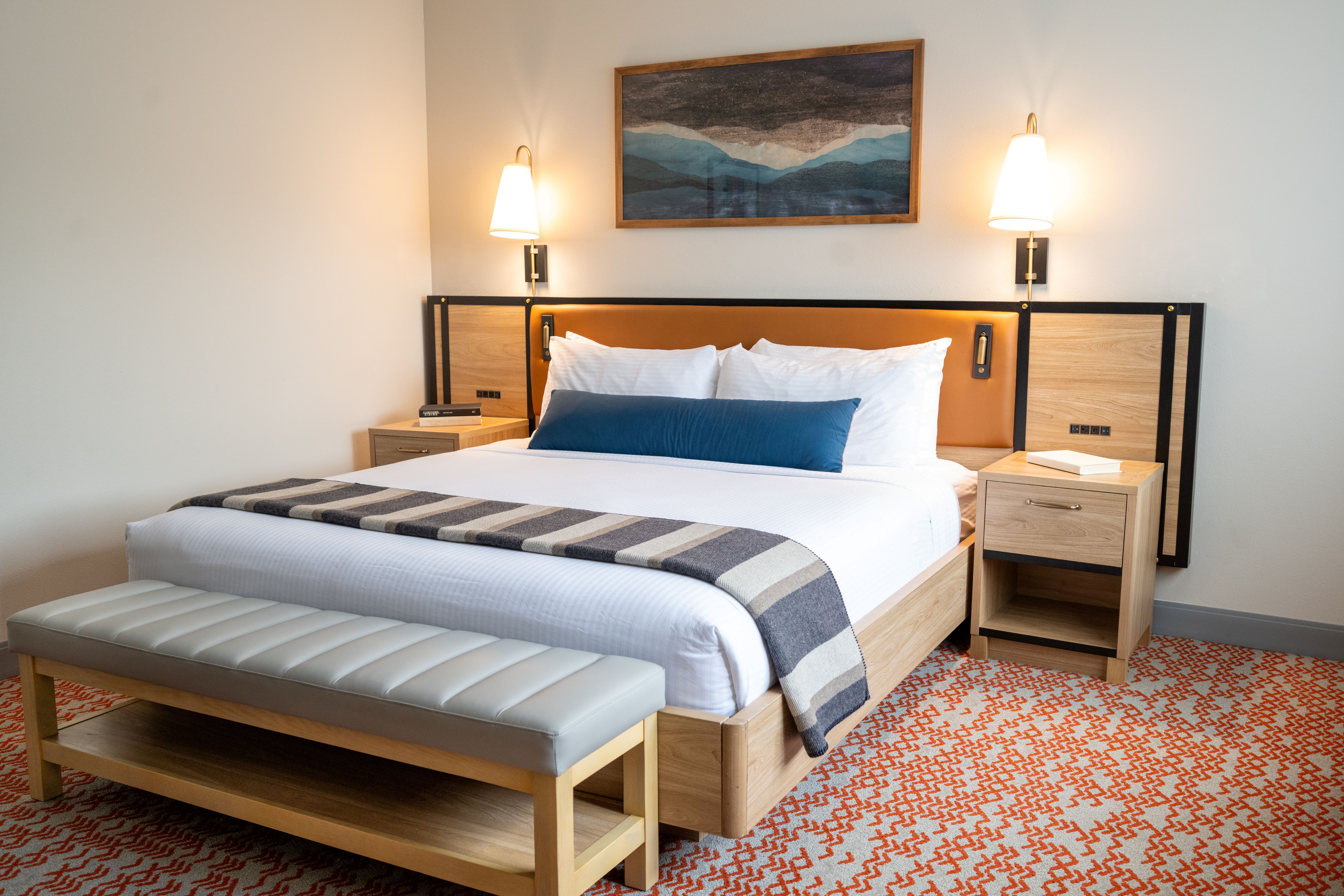 thoughtful-touches-like-reading-lights-in-the-headboard-await-guests