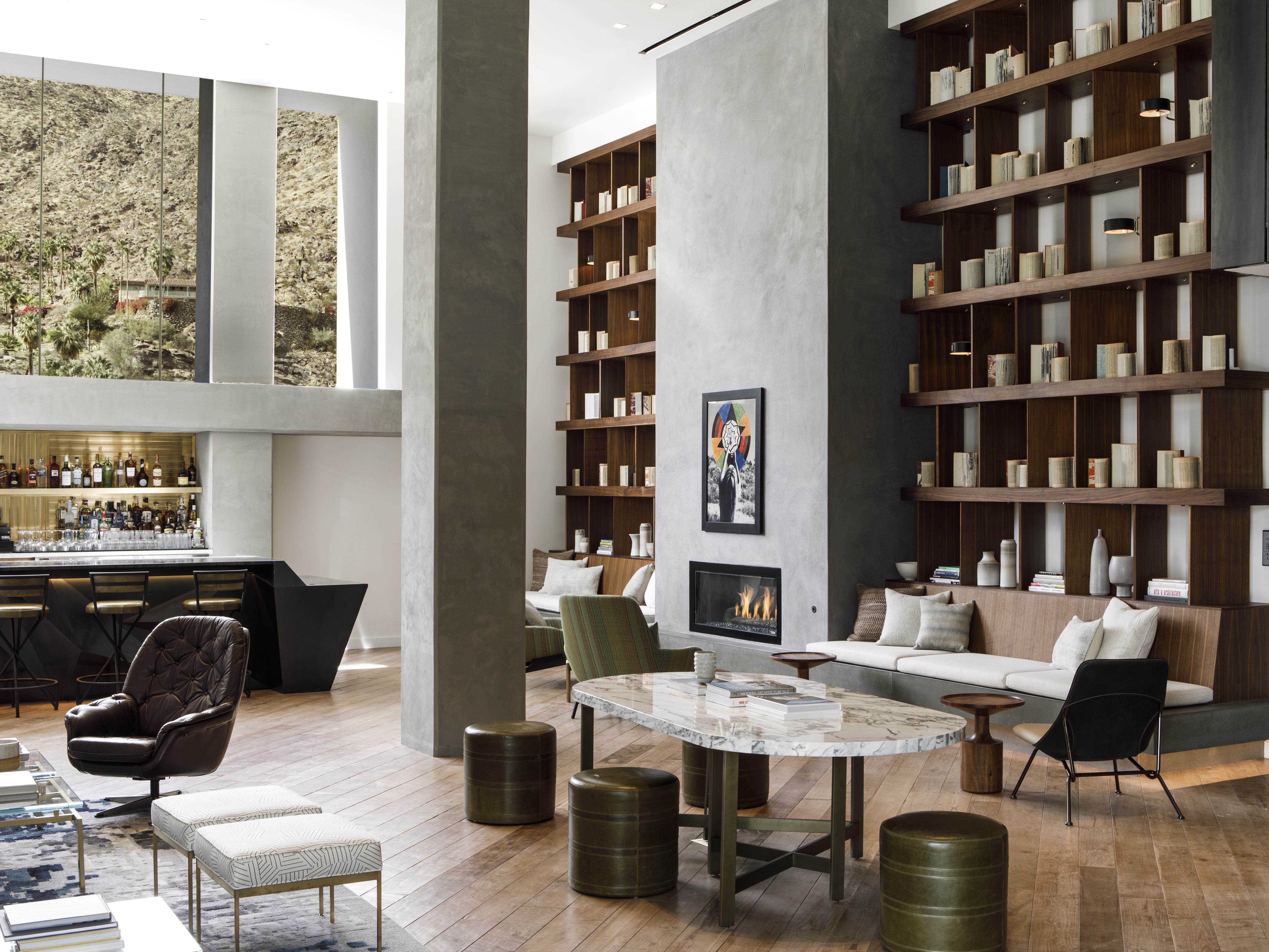 soaring-ceilings-plays-of-scale-and-ample-natural-light-establish-a-refreshing-arrival-in-the-lobby-living-room