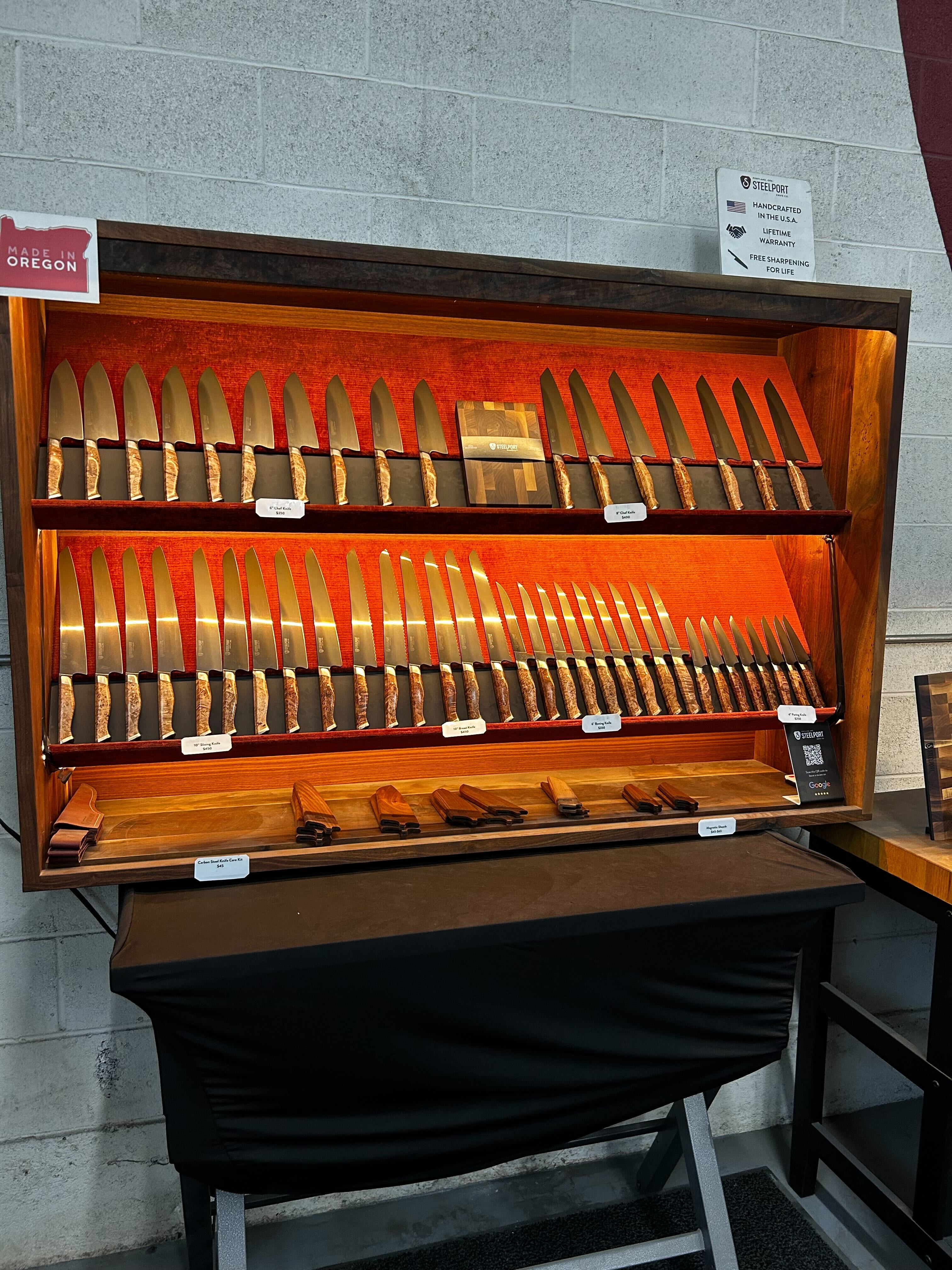 a-retail-case-display-of-just-finished-steelport-knives-available-for-sale