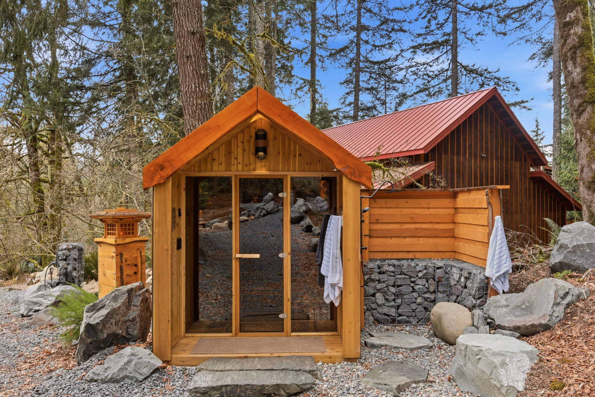 the-outdoor-shower-the-cold-rinse-between-cedar-sauna-and-hot-tub-steps-from-the-forest-floor