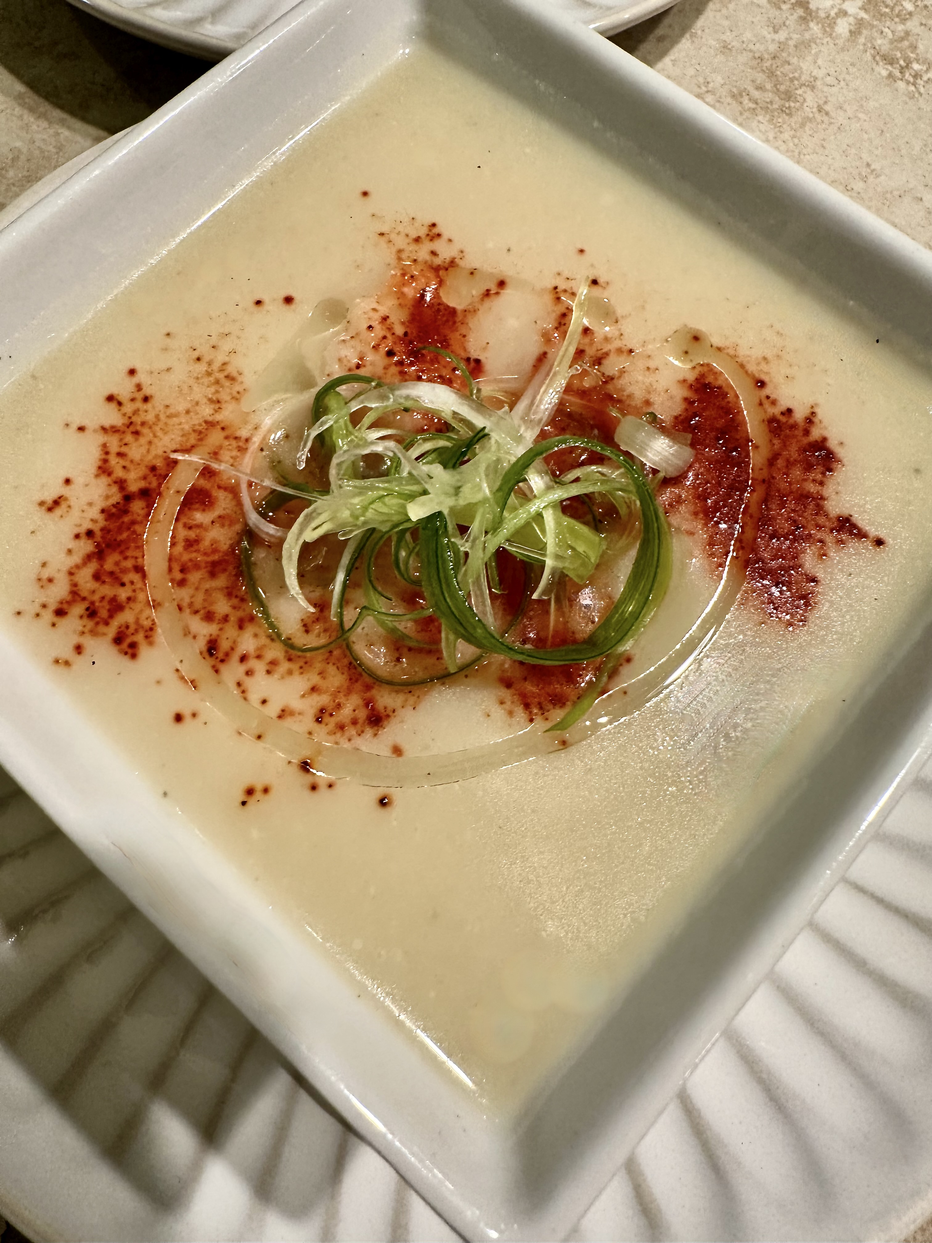 vegan-cauliflower-soup-with-beet-dust-scallionn-threads-white-truffle-oil