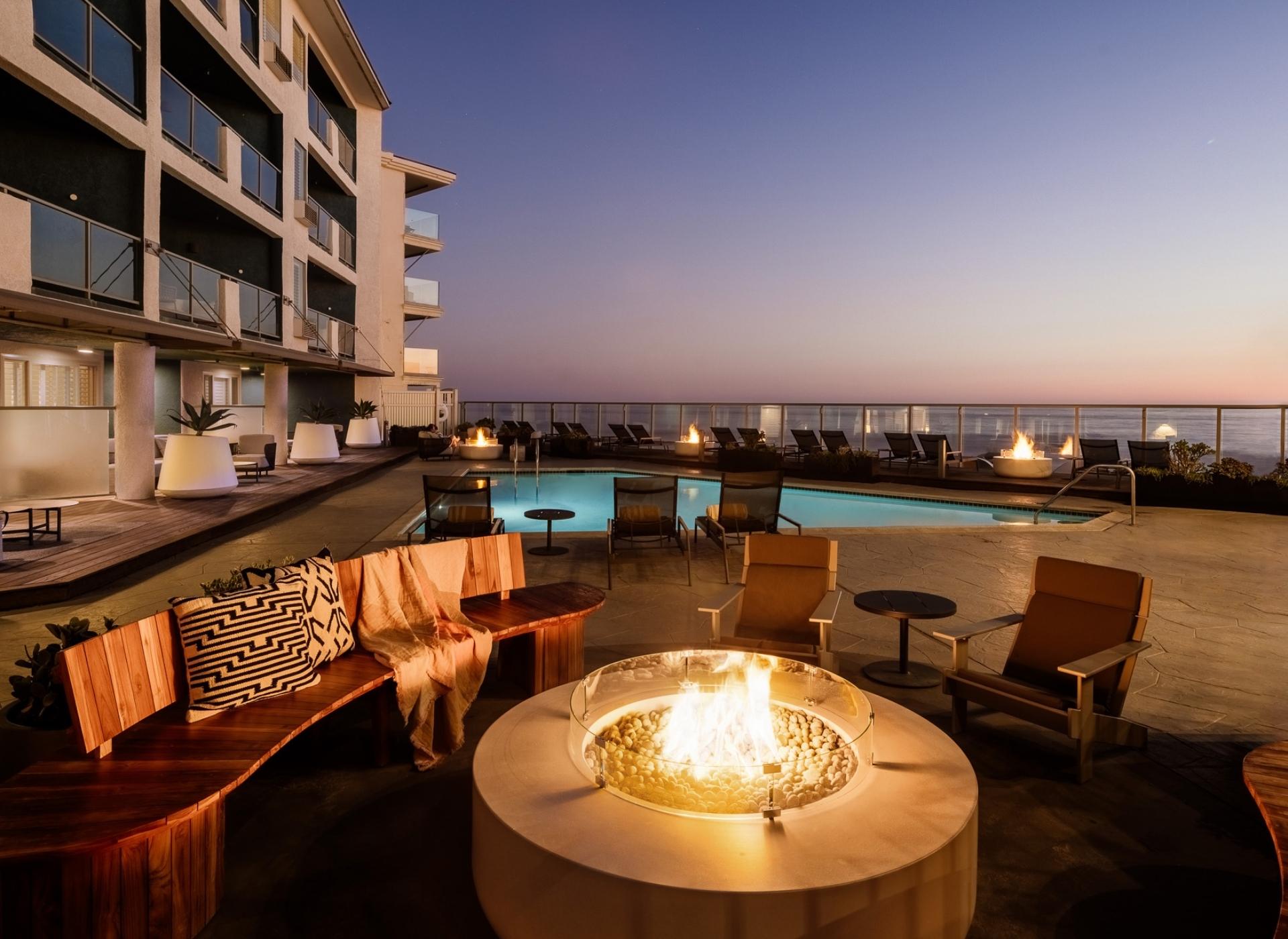 sit-down-unwind-at-one-of-the-hotels-five-beachfront-fire-circles