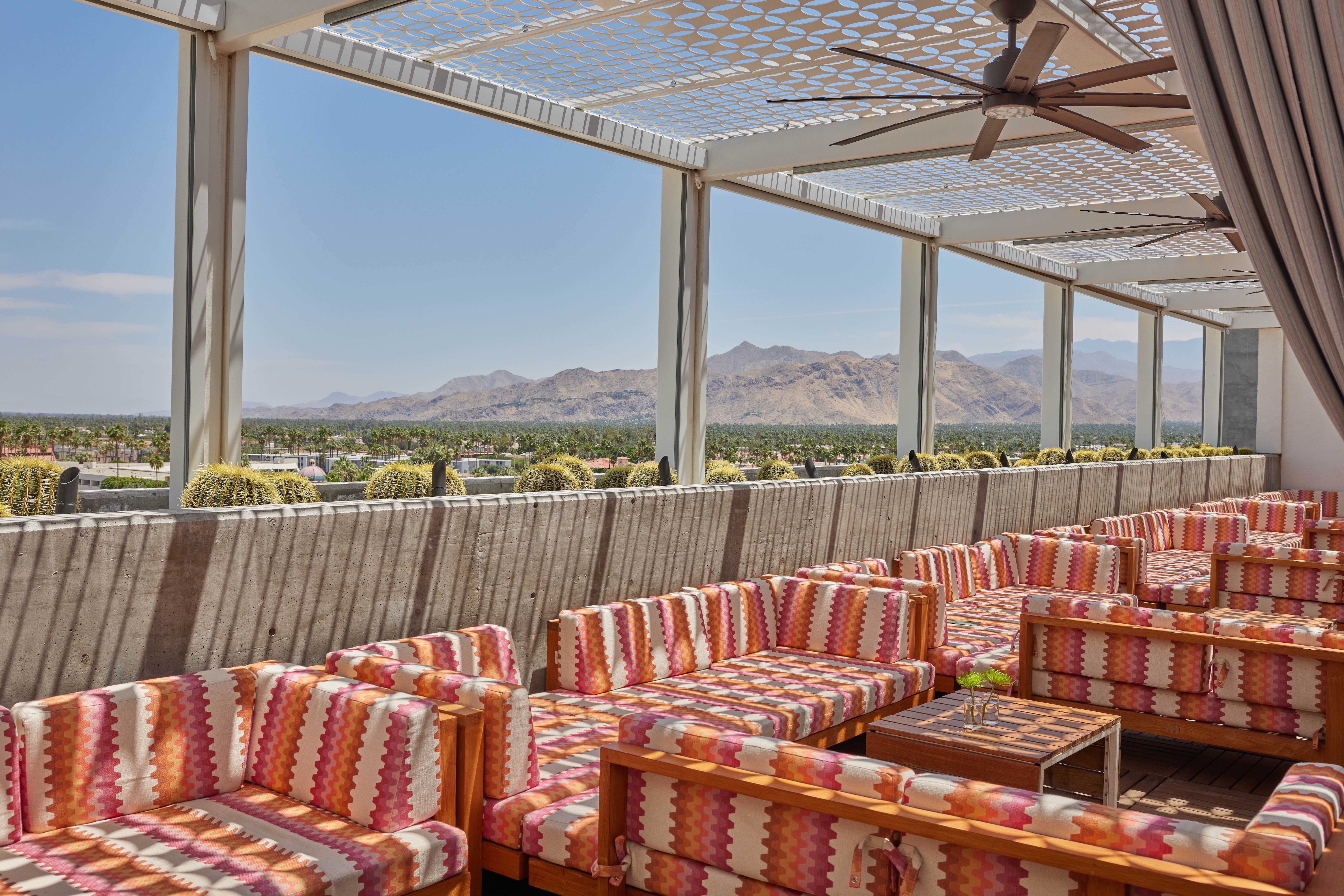 sun-kissed-cabanas-offer-filtered-shade-for-lounging-while-the-sweeping-landscape-serves-as-a-backdrop
