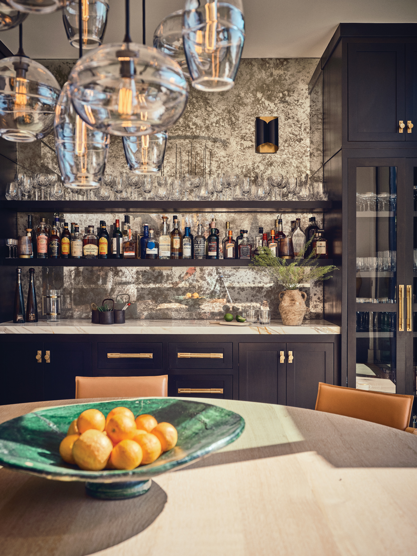 Kitchen and Bar Area with Black Cabinets
