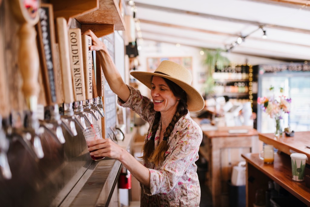 Owner/founder Crystie Kisler pouring in the taproom