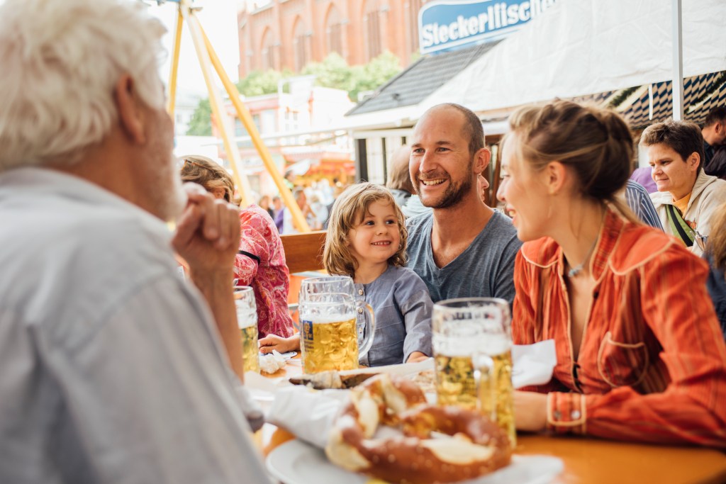 Family enjoys their lunch at Oktoberfest.