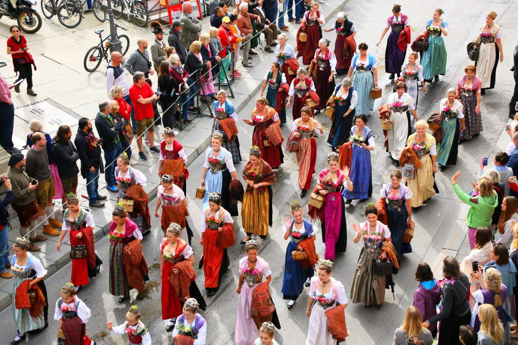 Oktoberfest parade women in traditional clothing.