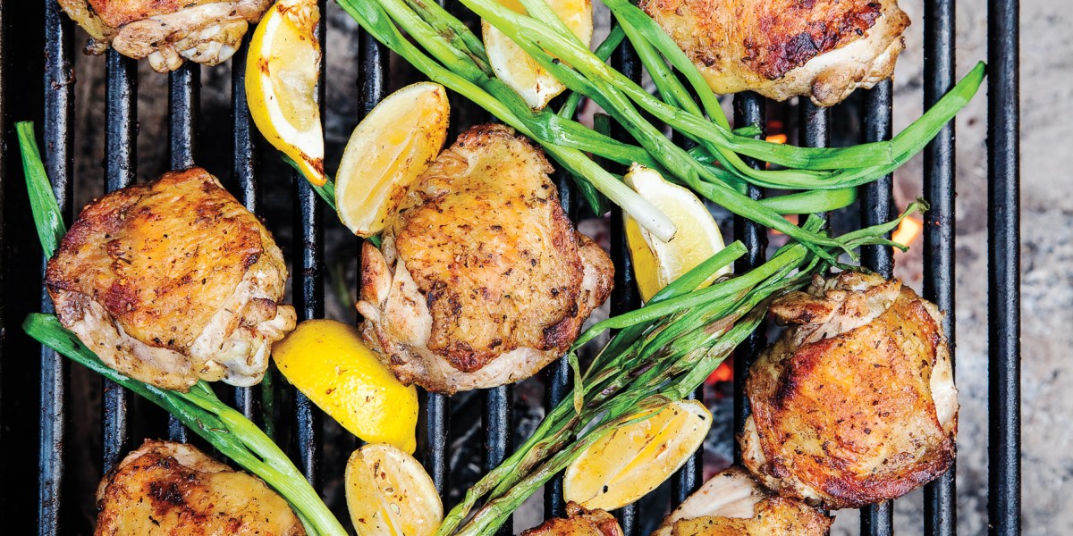 Camp chicken dinner over grill