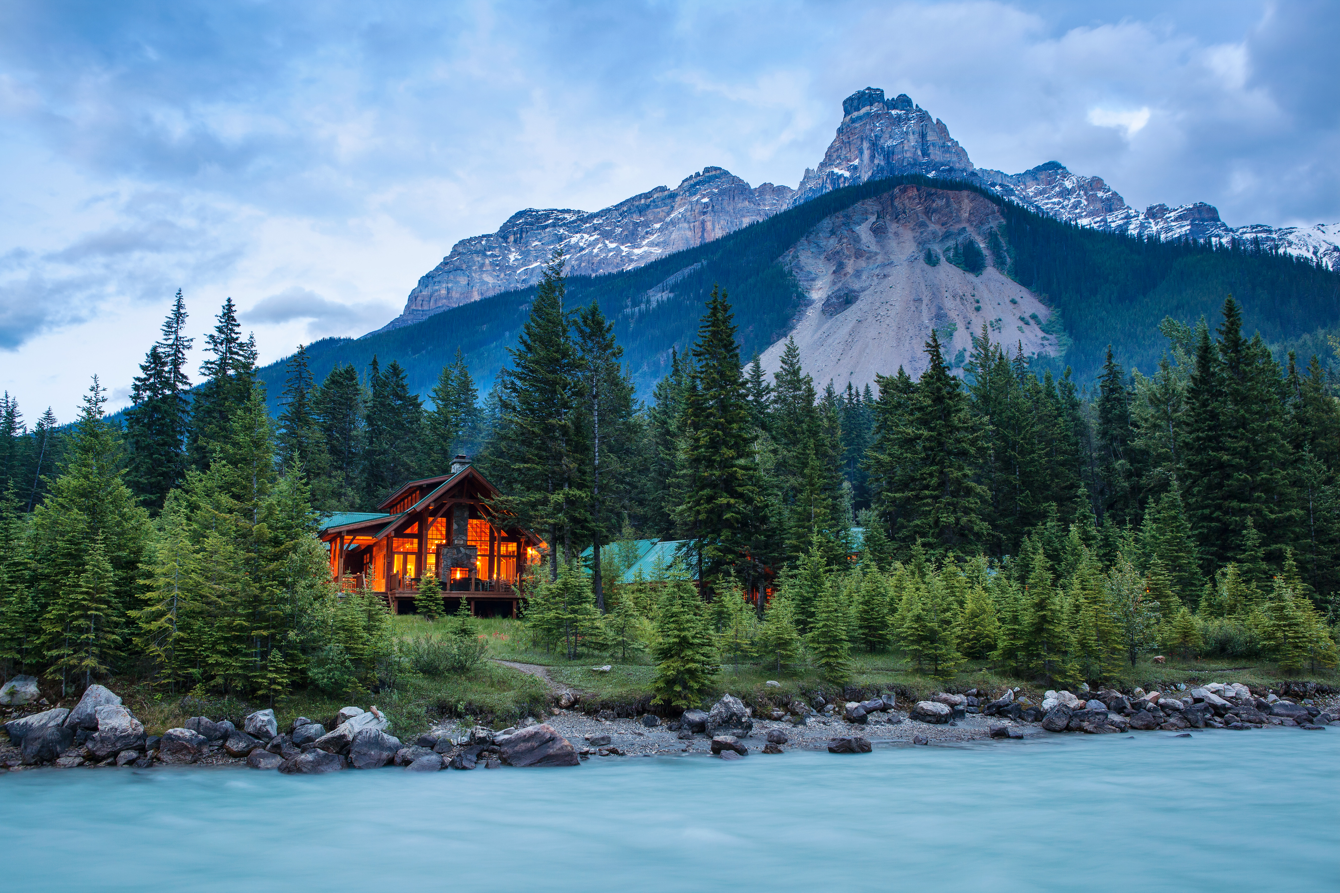 Cathedral Mountain Lodge with glacier-fed river.jpg