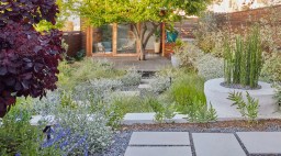A Cabana that opens out to the hot tub makes full use of a San Francisco Garden