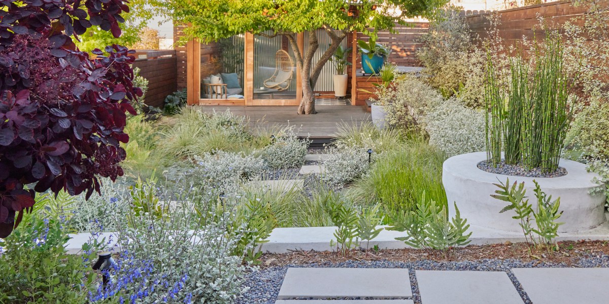 A Cabana that opens out to the hot tub makes full use of a San Francisco Garden