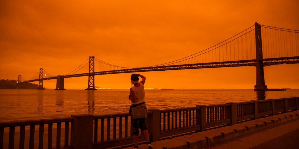 Bay Bridge In Dark Orange Haze