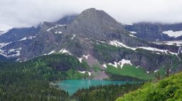 Landscape blue lake green trees mountains