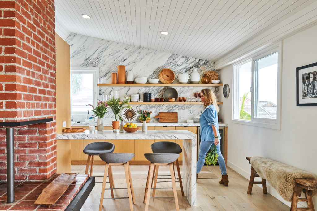 Tess Sanchez walking in her kitchen in California