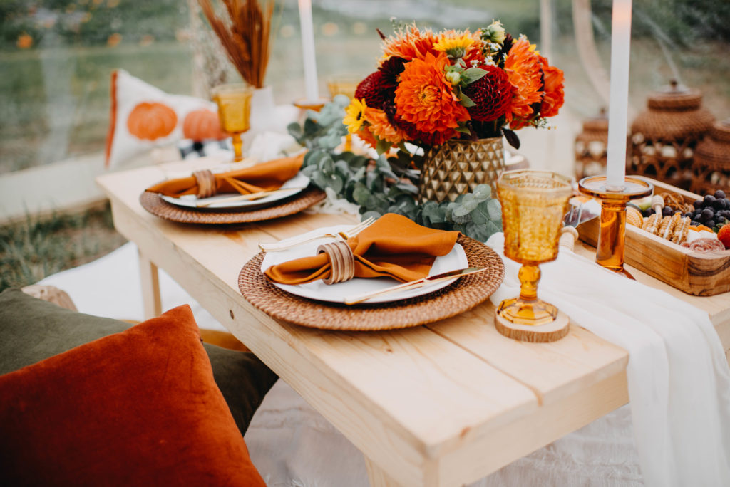 Picnic Set Up with orange and white decor  Picnic decorations, Picnic  party, Picnic inspiration