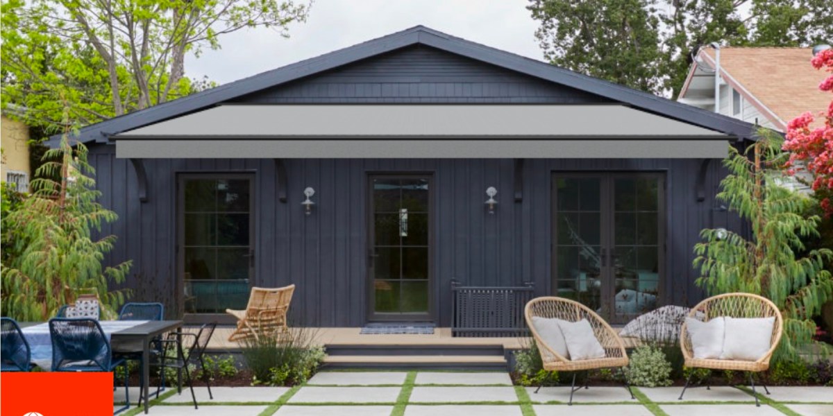 Farmhouse shown with Crest Ash (4662) Sunbrella awning with black frame on a dark blue house created with Sunbrella Shade Studio.