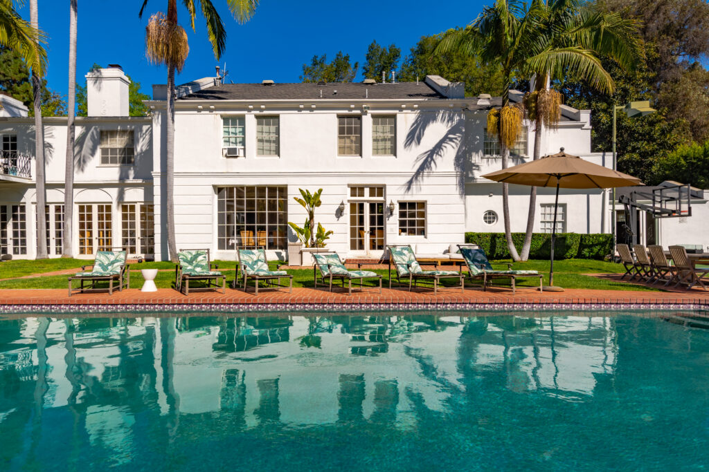 Large outdoor pool in front of house