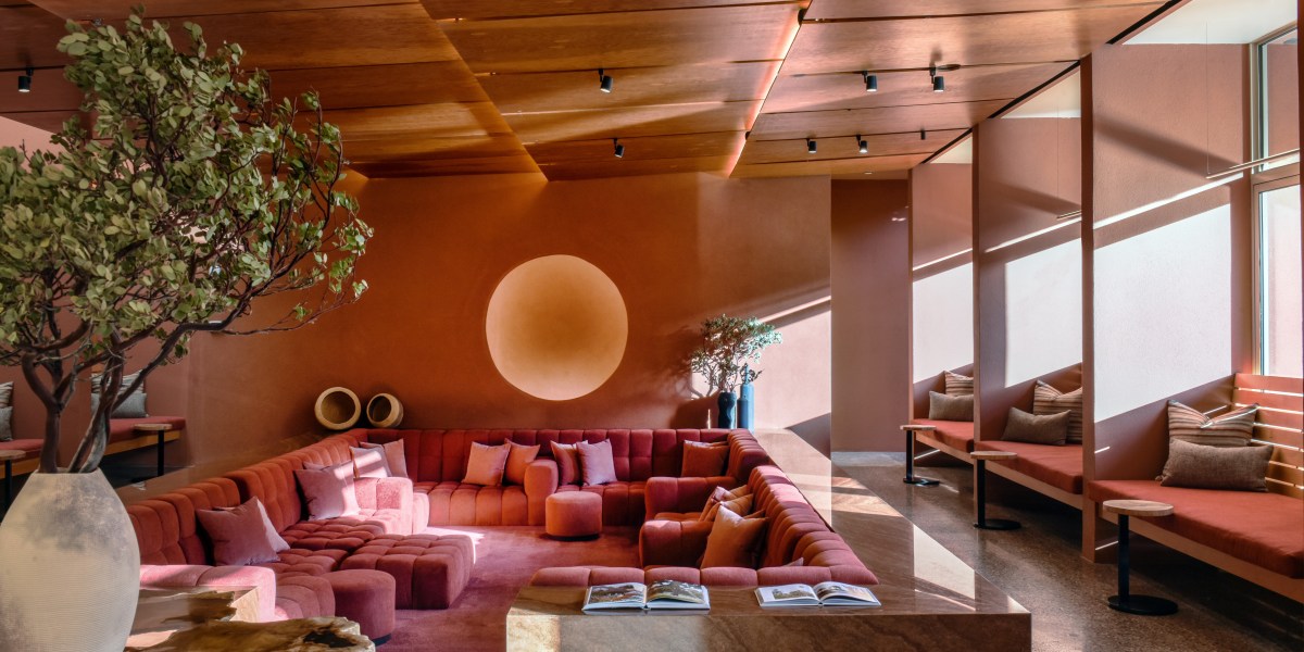 A large sunken couch in a spa lounge area.