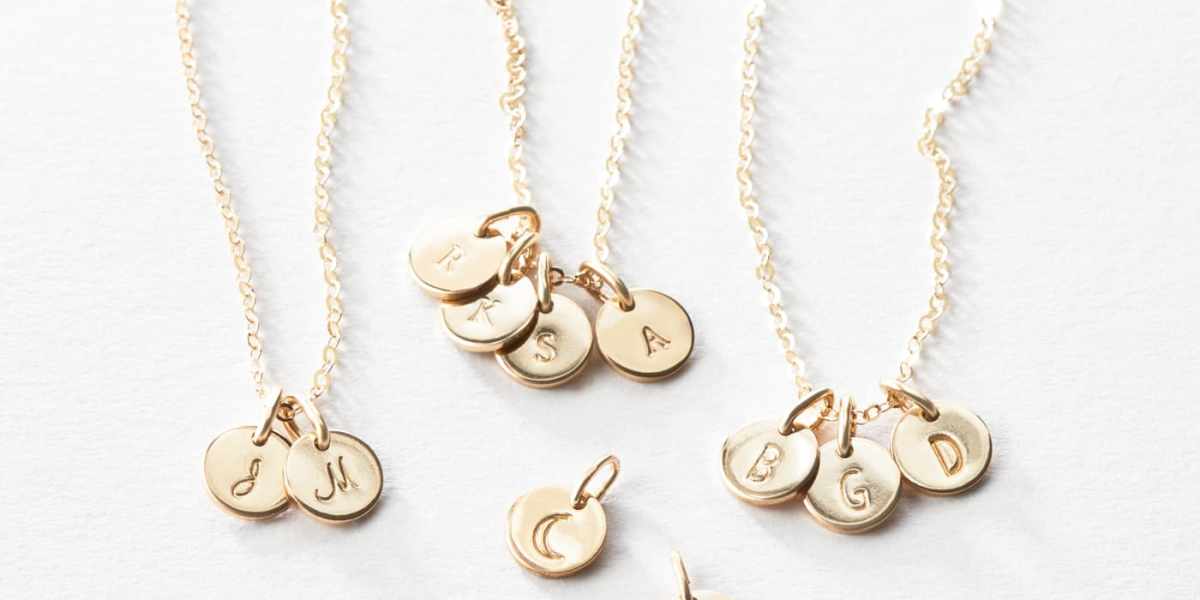 gldn tiny initial necklace