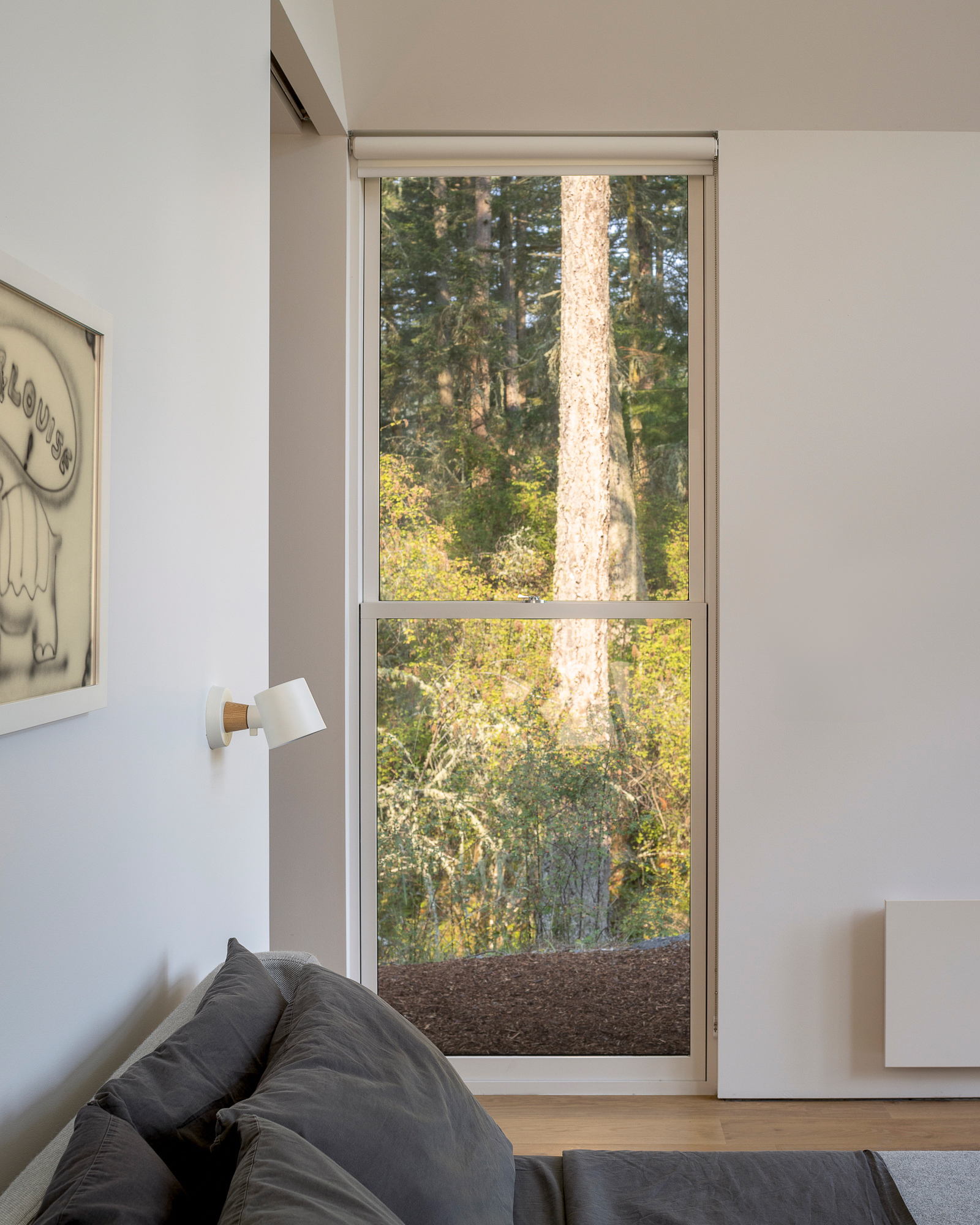 Bedroom in Orcas Island Retreat by Heliotrope Architects
