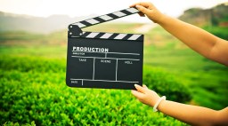Woman with a Clapper Board