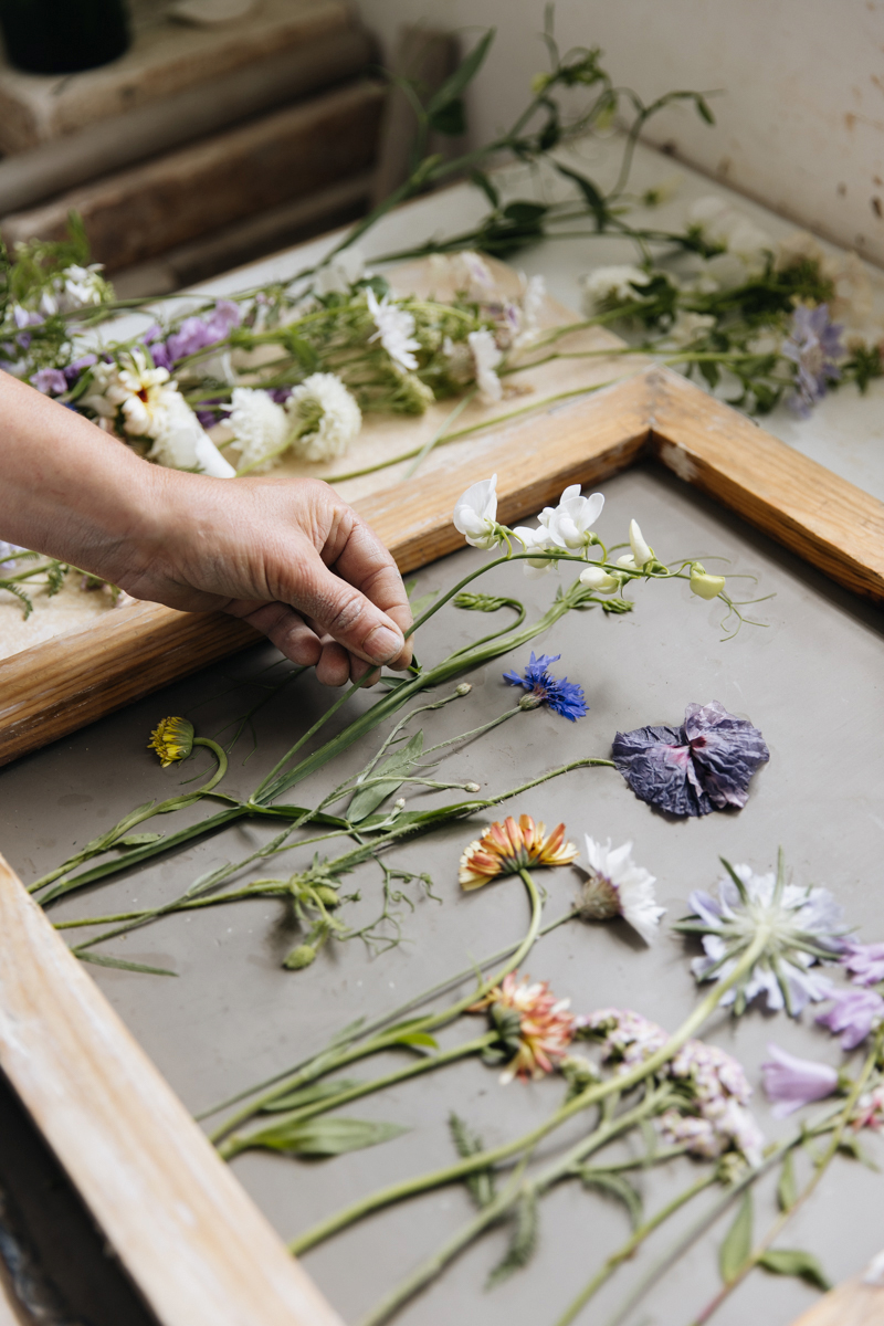 Placing Flowers in Clay