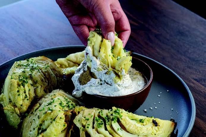 Cabbage Baked in Embers with Yogurt, Sumac, and Lemon Zest
