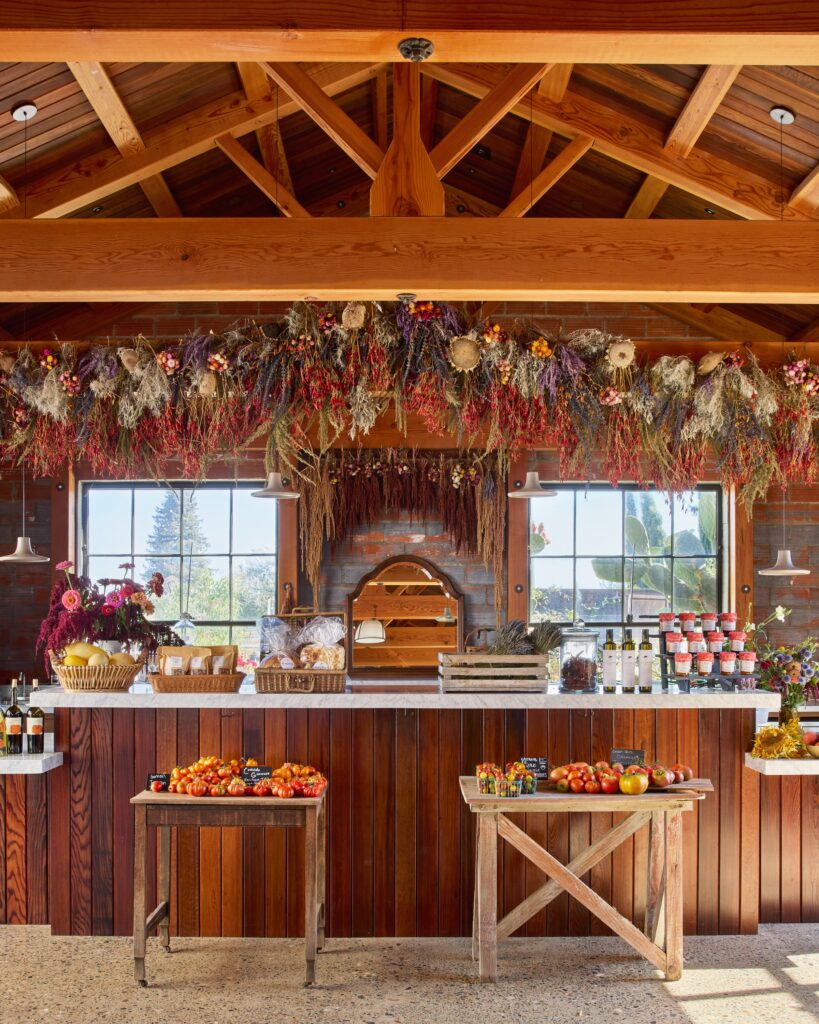 A countertop with baked goods, jam, and more