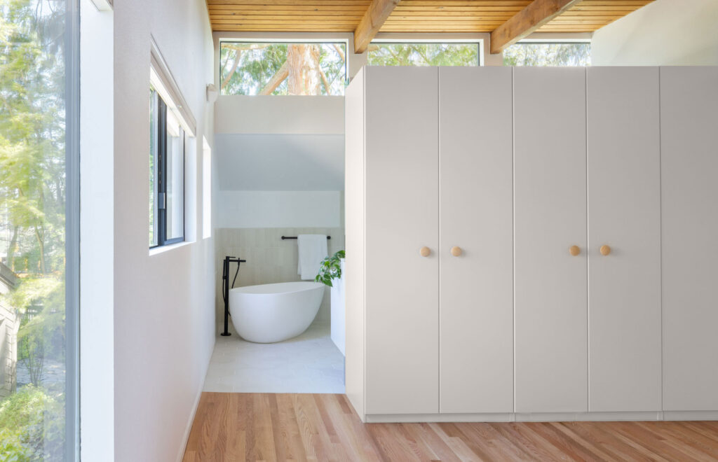 Closet in Wedgewood Seattle House by Best Practice Architecture
