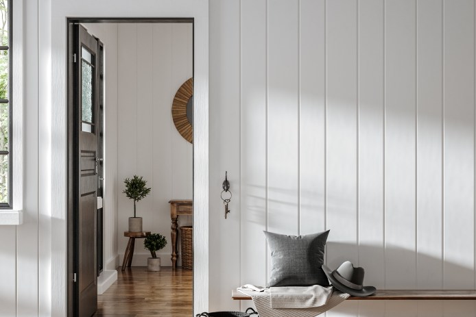 An entryway with a bench and key hook.