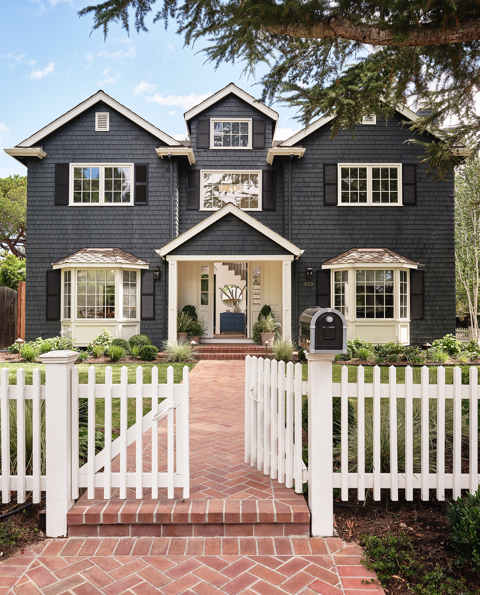 Exterior Cape Cod House by MEM Interiors