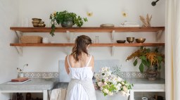 Teressa Johnson Floral Studio white flowers kitchen sink and floating shelves