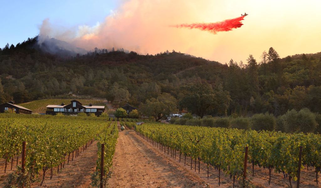 Plane Dropping Flame Retardant