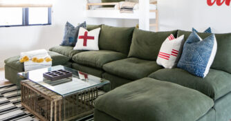 Green Upholstered Sectional by Ashley Clark