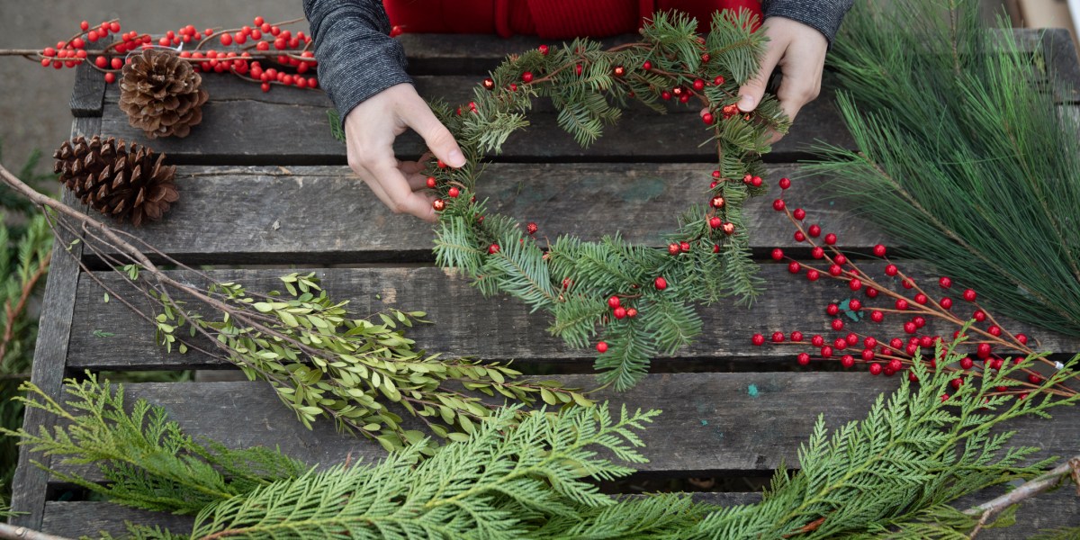 Woman making Christmas wreath