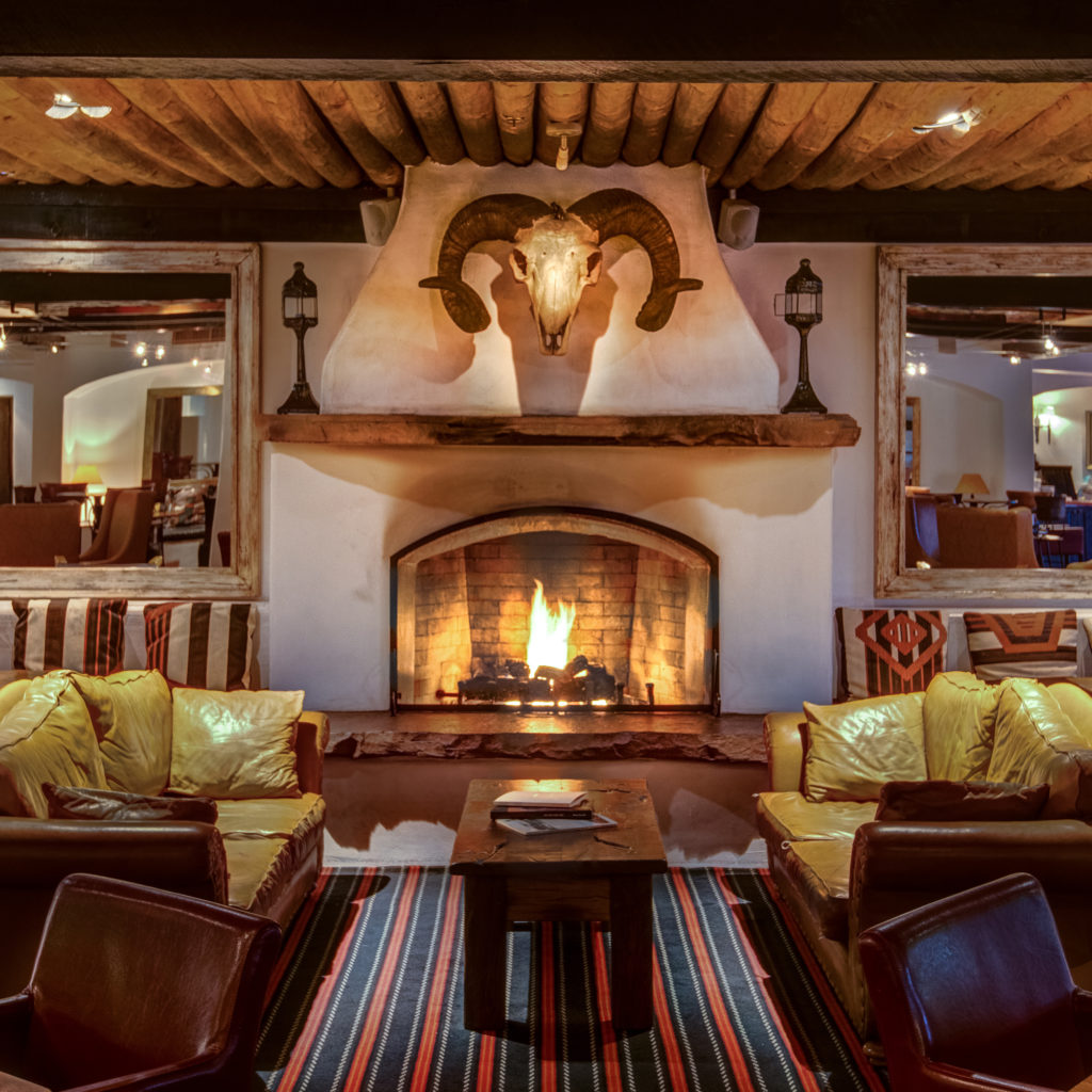 Fireplace and Cow Skull at Inn at Loretto