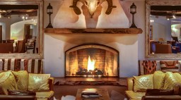 Fireplace and Cow Skull at Inn at Loretto