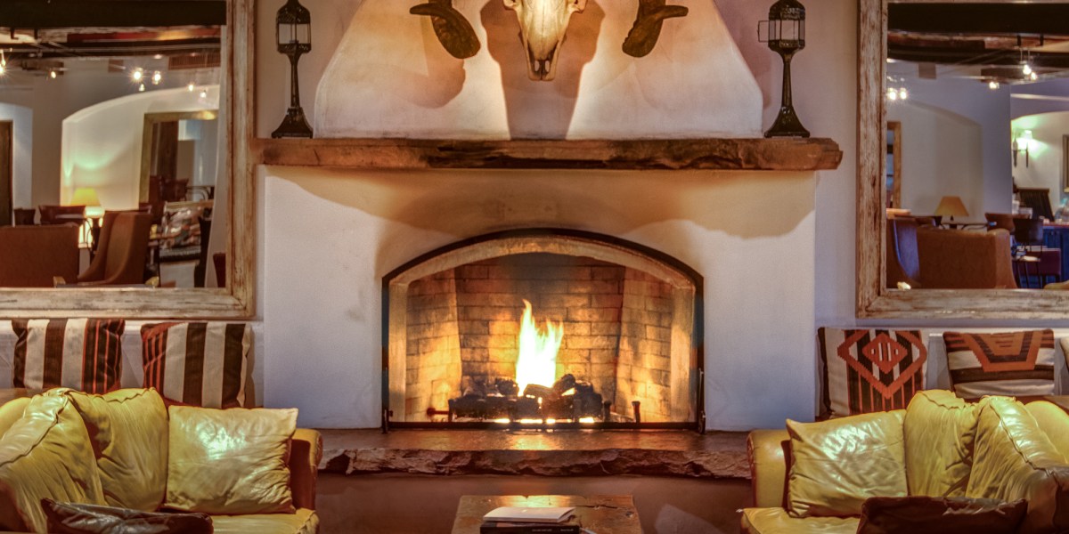 Fireplace and Cow Skull at Inn at Loretto