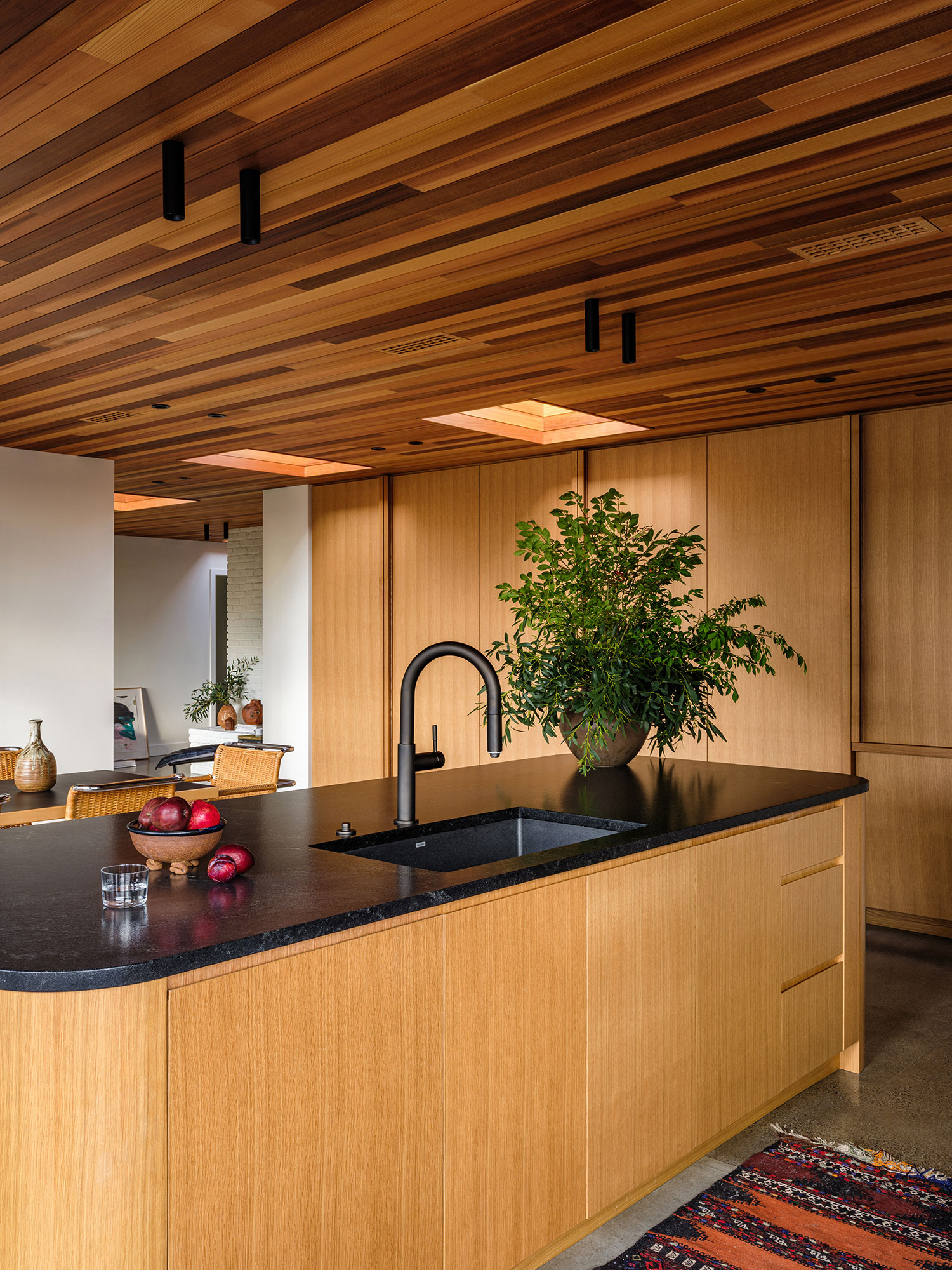 Kitchen Island in Portland Mid-Century House by Ment Architecture
