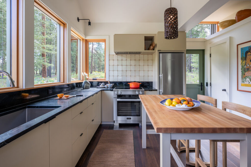 Kitchen Island in Washington Cabin by Best Practice Architecture