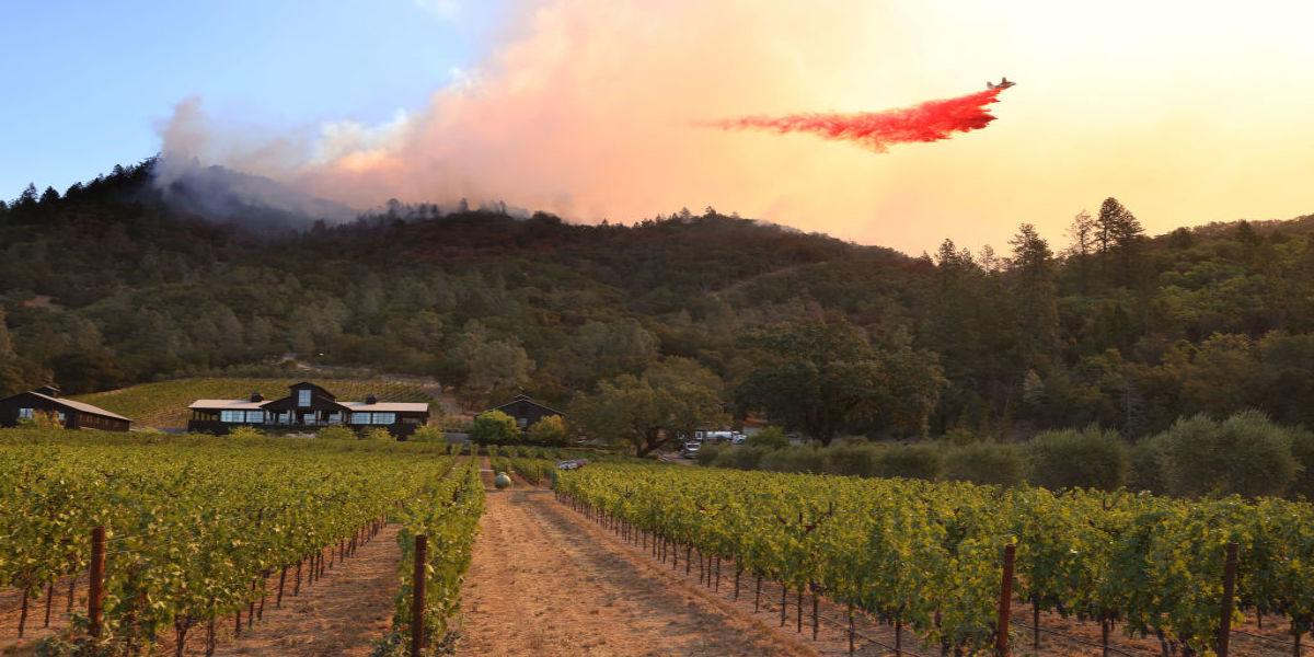 Plane Dropping Flame Retardant