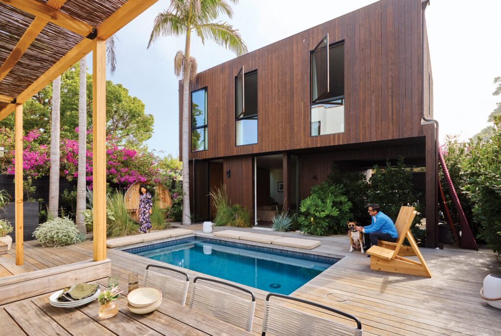 Pool in Front of the Backyard Home