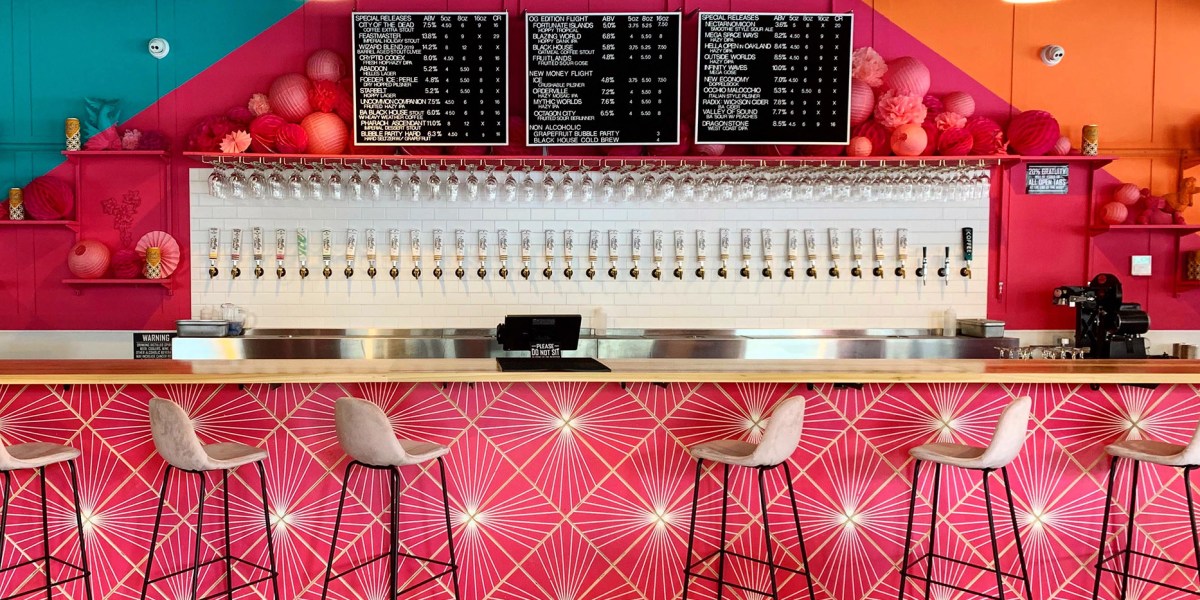 Brightly colored bar with taps at Modern Times Oakland